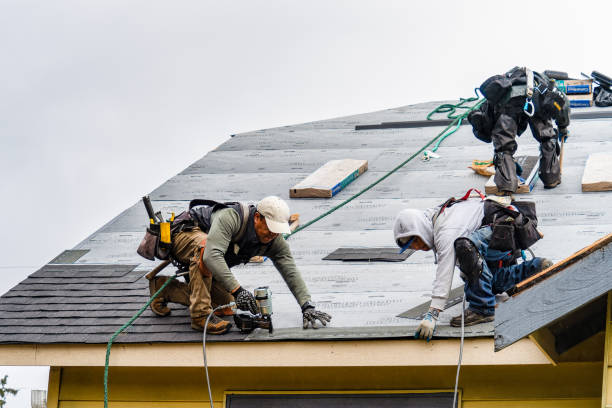 Professional Gutter Installation technician working in Farmersburg, IN